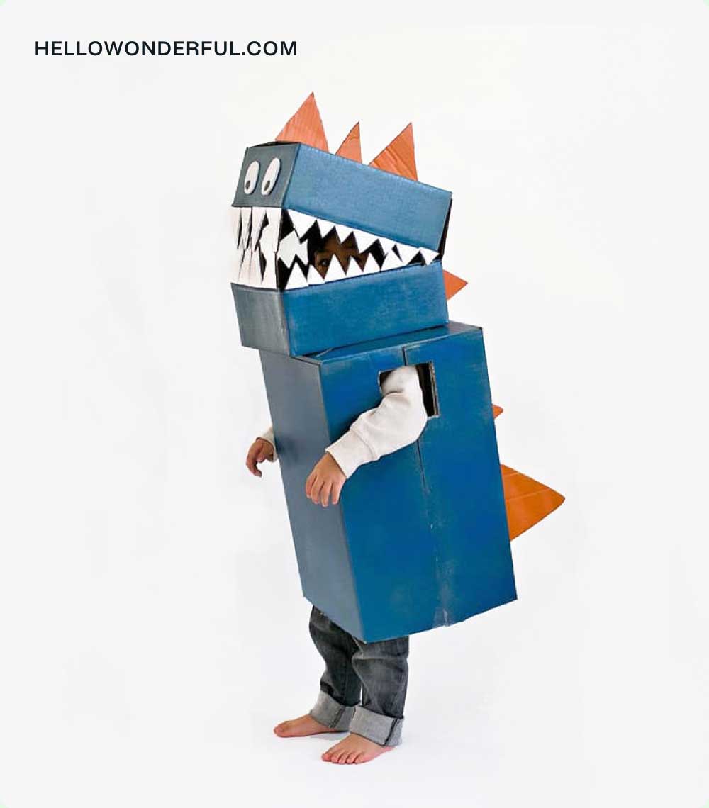 Kid's dinosaur costume hand crafted with cardboard | HelloWonderful.com